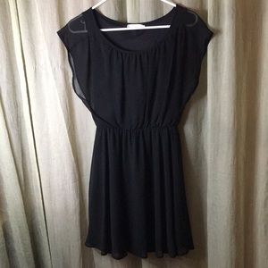 Lush black dress with cinched waist